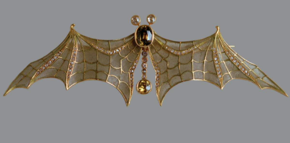 Gold, plique-à-jour enamel and diamond bat brooch, Austria, circa 1905.