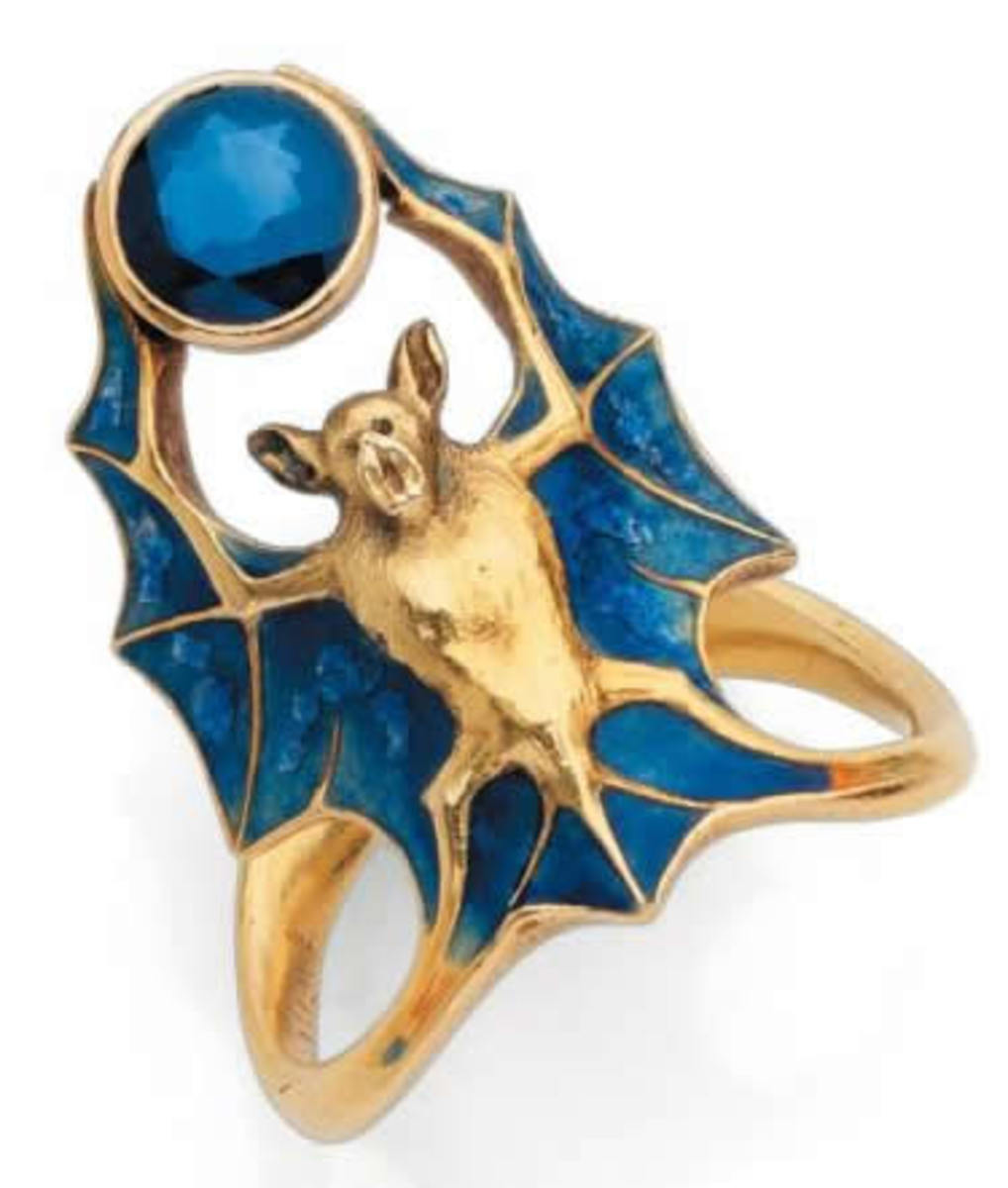 Another chauve-souris (bat) ring by René Lalique, circa 1901, featuring a gold and blue enamel flying bat with an overhead sapphire. This sold for $44,645 at Piasa.