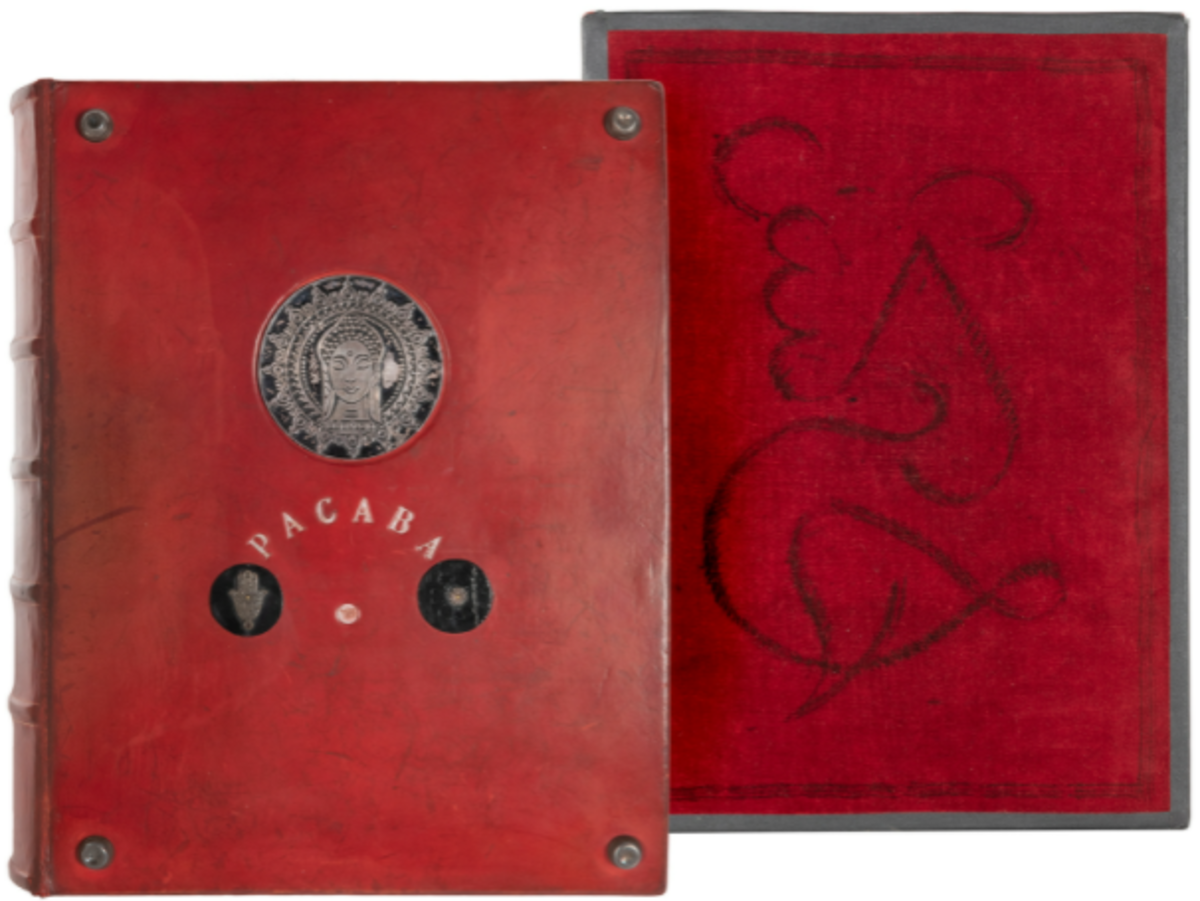 Stanley Jaks' Book of Mysteries sold for $96,000. A finely constructed book box approximating the size of a large Bible, it is richly bound in red leather with sterling silver detailing on the front board, including the text “PACABA” flanked by two mystical symbols, the letters set below the face of the Hindu goddess Kali, said to be a gift to Jaks from the Aga Khan.