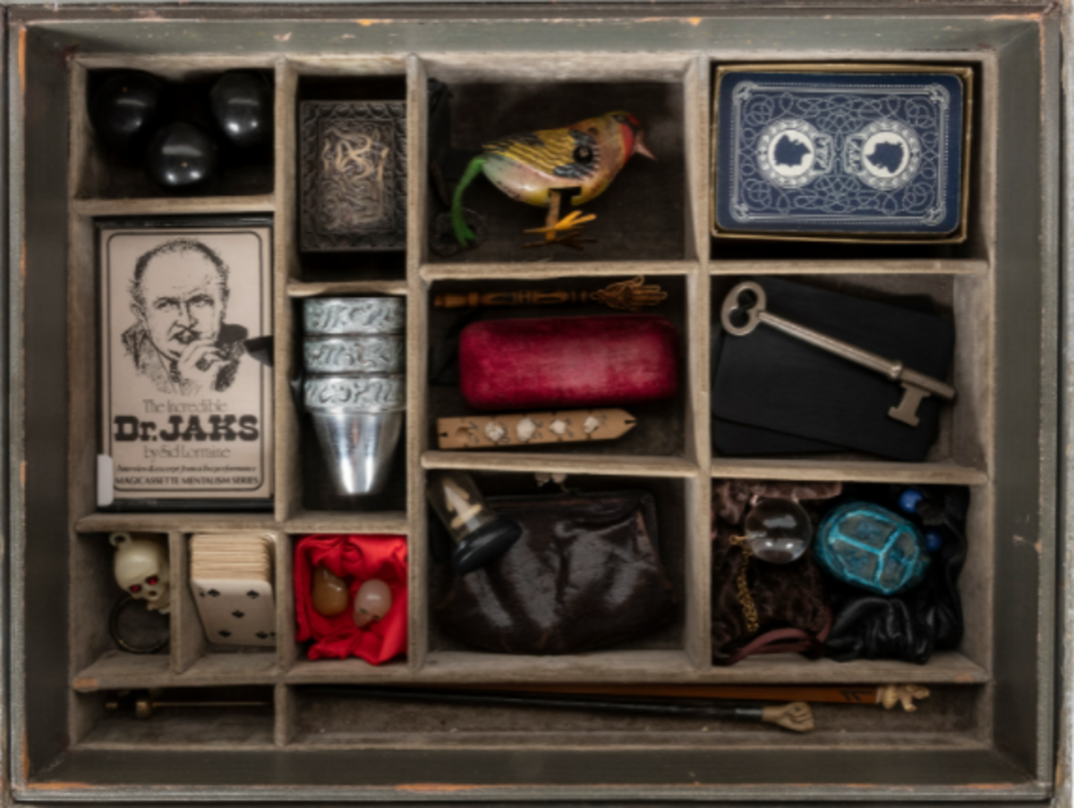One of the compartmentalized trays of miniature magic props that are inside of the Book of Mysteries that were used for many of Jaks’ most famous routines.