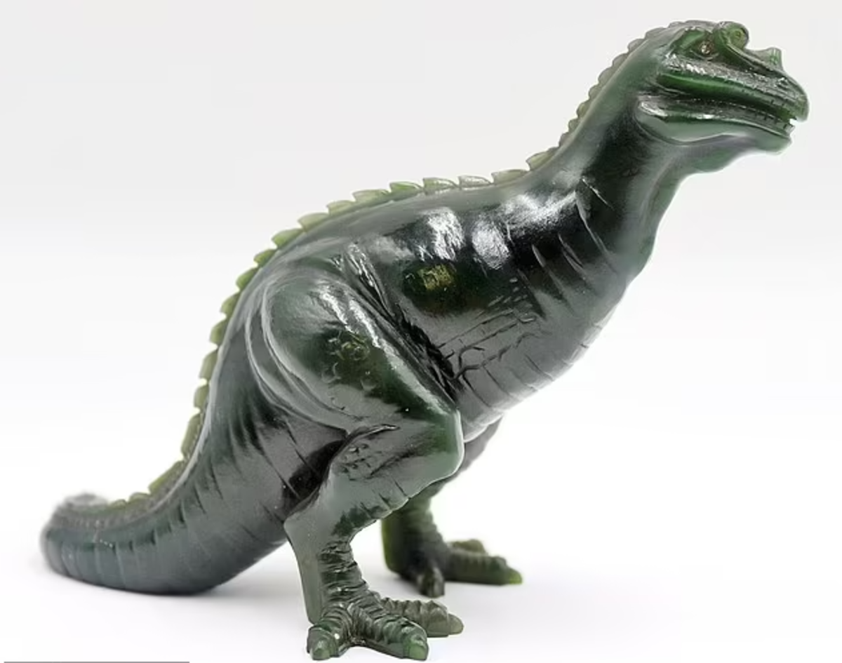 The ultra-rare Fabergé nephrite jade Tyrannosaurus Rex, with rose cut diamond eyes, sold for $65,000 at Clarke Auction Gallery.