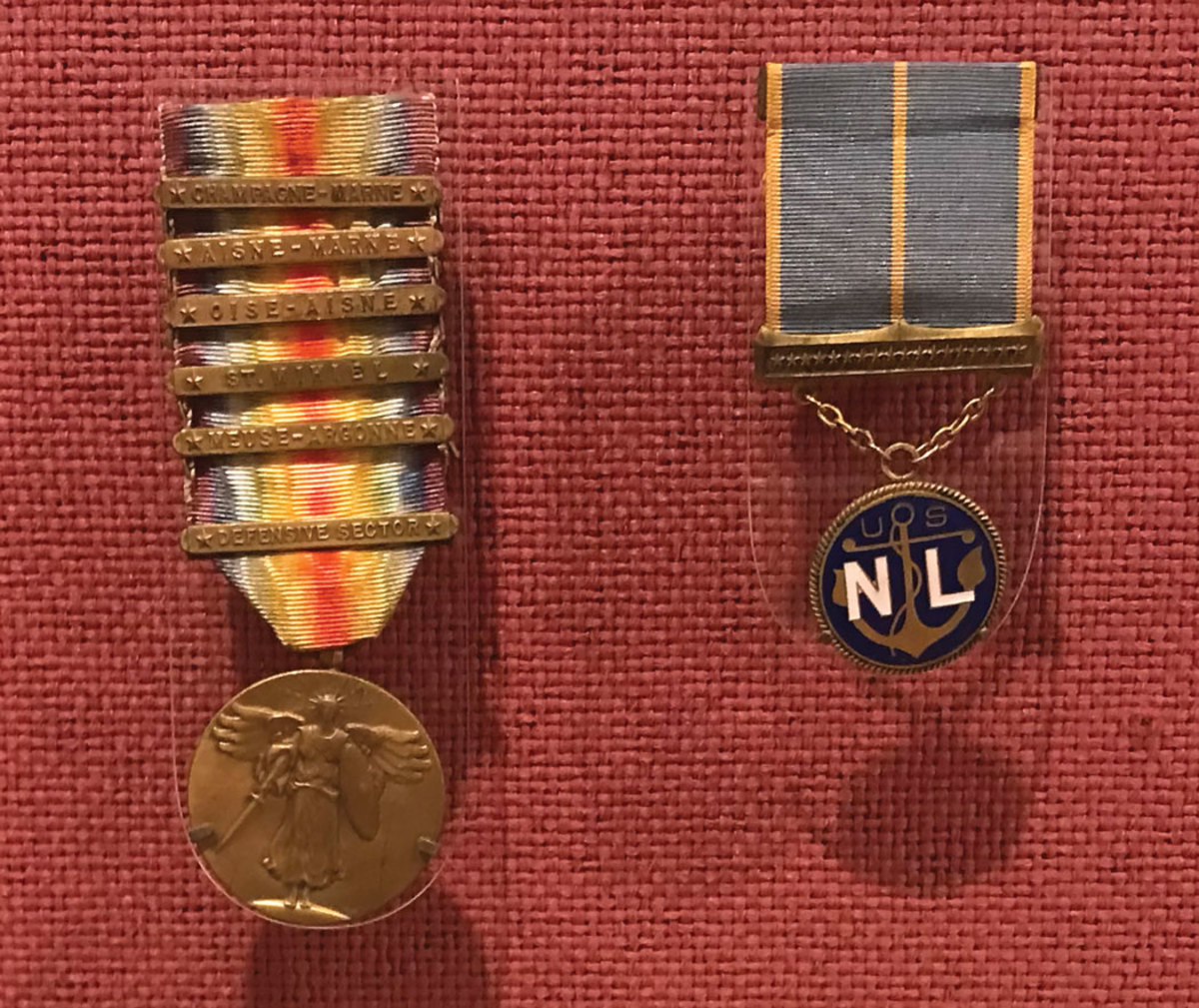 Elizabeth Collins Lee, class of 1896, served as a nurse in France during World War I. She earned a citation of merit for her courage in carrying wounded men to safety while under enemy fire and these medals: the Royal Red Cross of France medal, left, and the U.S. Navy League medal.