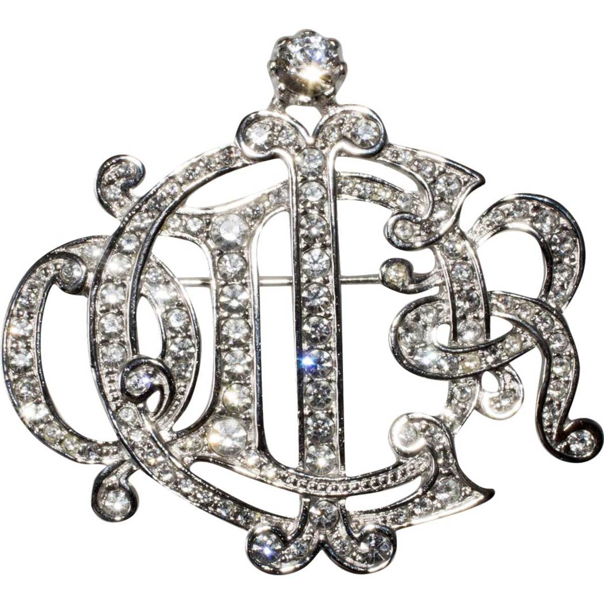 Christian Dior logo brooch