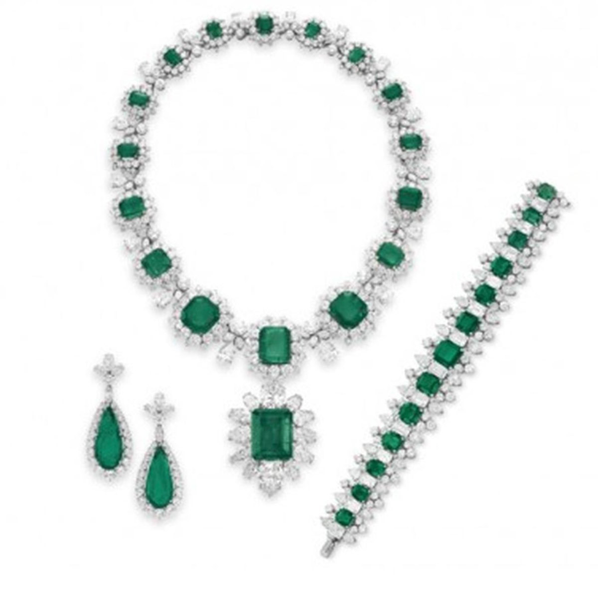 The BVLGARI emerald-and-diamond pieces Burton gifted to Taylor over the years: the necklace, 1962, sold for $6.1 million; the brooch, 1958, suspended from the necklace, sold for $6.5 million; the earrings, 1960, sold for $3.2 million; and the bracelet, 1963, sold for $4 million.