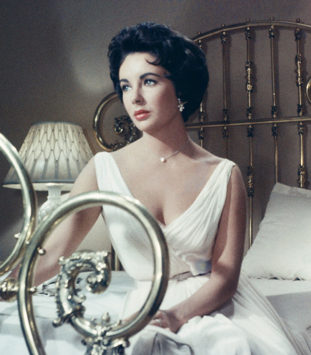 Elizabeth Taylor wearing the diamond heart pendant in "Cat On A Hot Tin Roof," 1958.