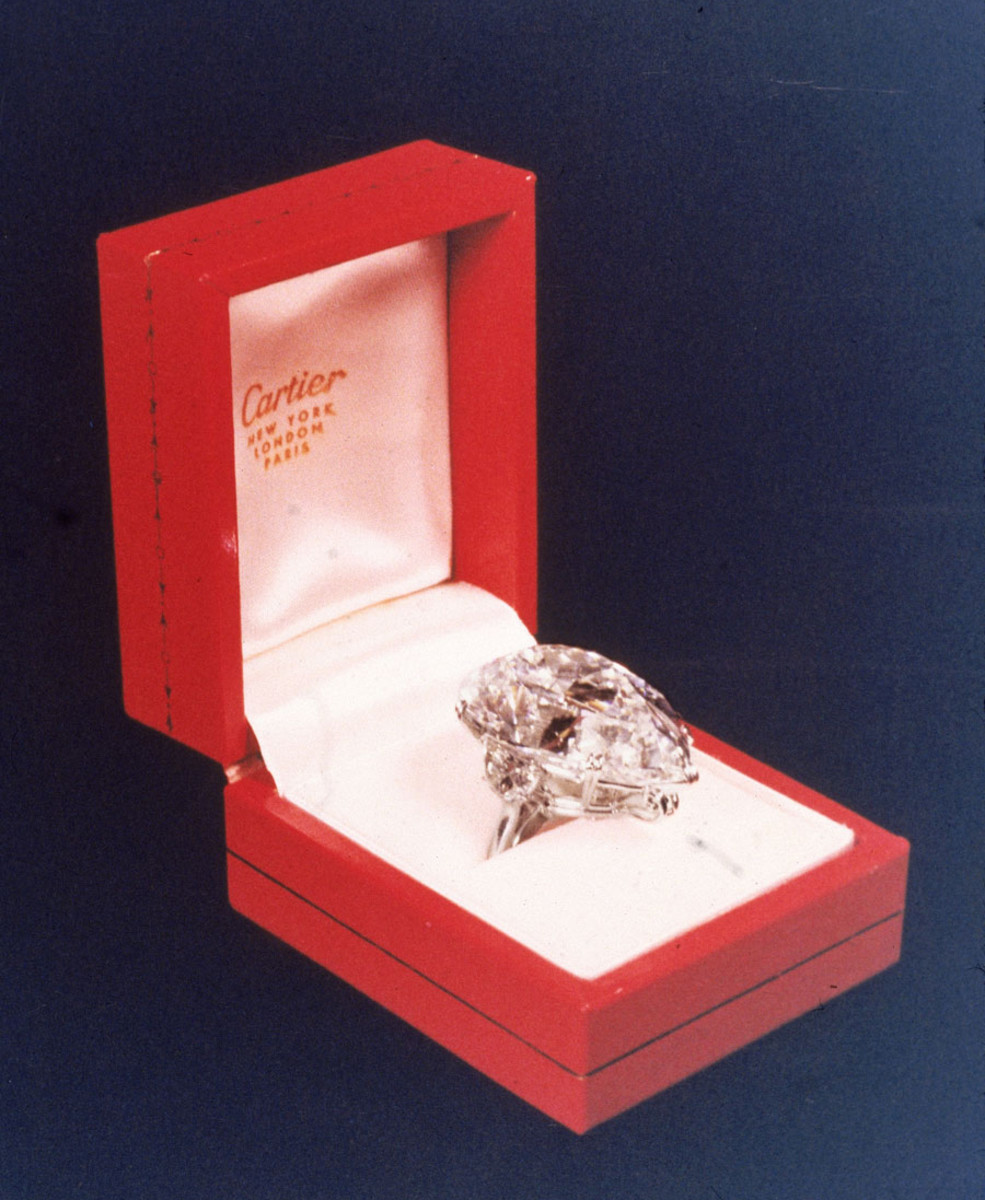 Close-up view of the 69.2-carat Cartier diamond in red case, which was sold at auction for $1,050,000 in 1969 and subsequently purchased by actor Richard Burton for his wife, Elizabeth Taylor.