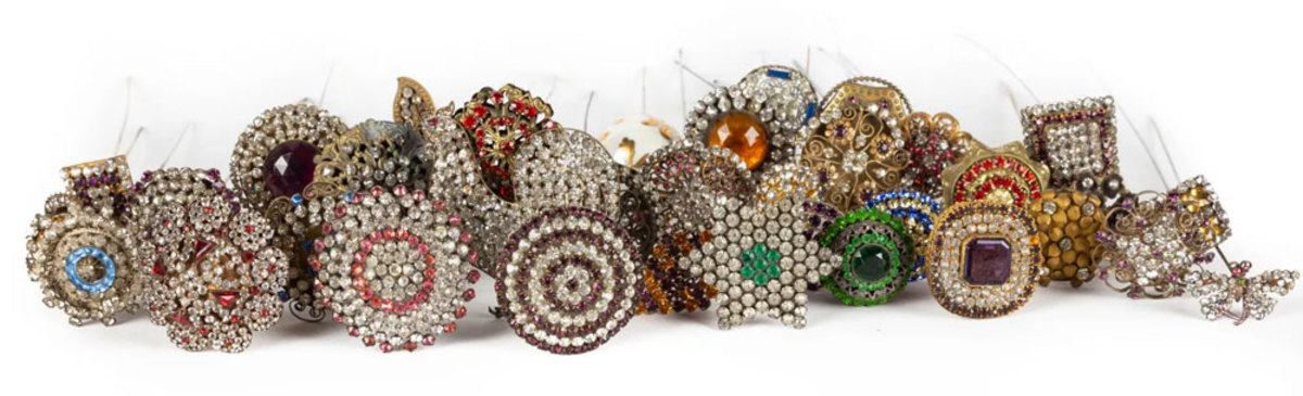 A group of various hatpins from the 19th and 20th centuries, including past and rhinestones; the widest one is 2-3/4". This group sold in January for $3,750 against an estimate of $400-$600.