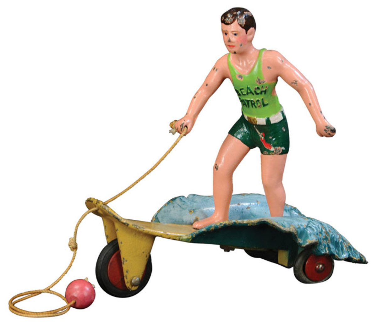 Hubley Surfer Boy cast-iron pull toy from a line of toys originally used to advertise Jantzen swimwear, complete with decals and original pull cord; estimate: $10,000-$15,000.