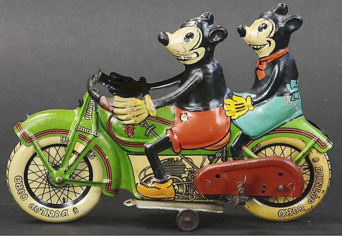 A rare and desirable toy by Tipp & Co., Germany, circa 1932, this Mickey & Minnie Mouse Motorcycle sold for a record $222,000, zooming past its estimate of $25,000-$45,000.