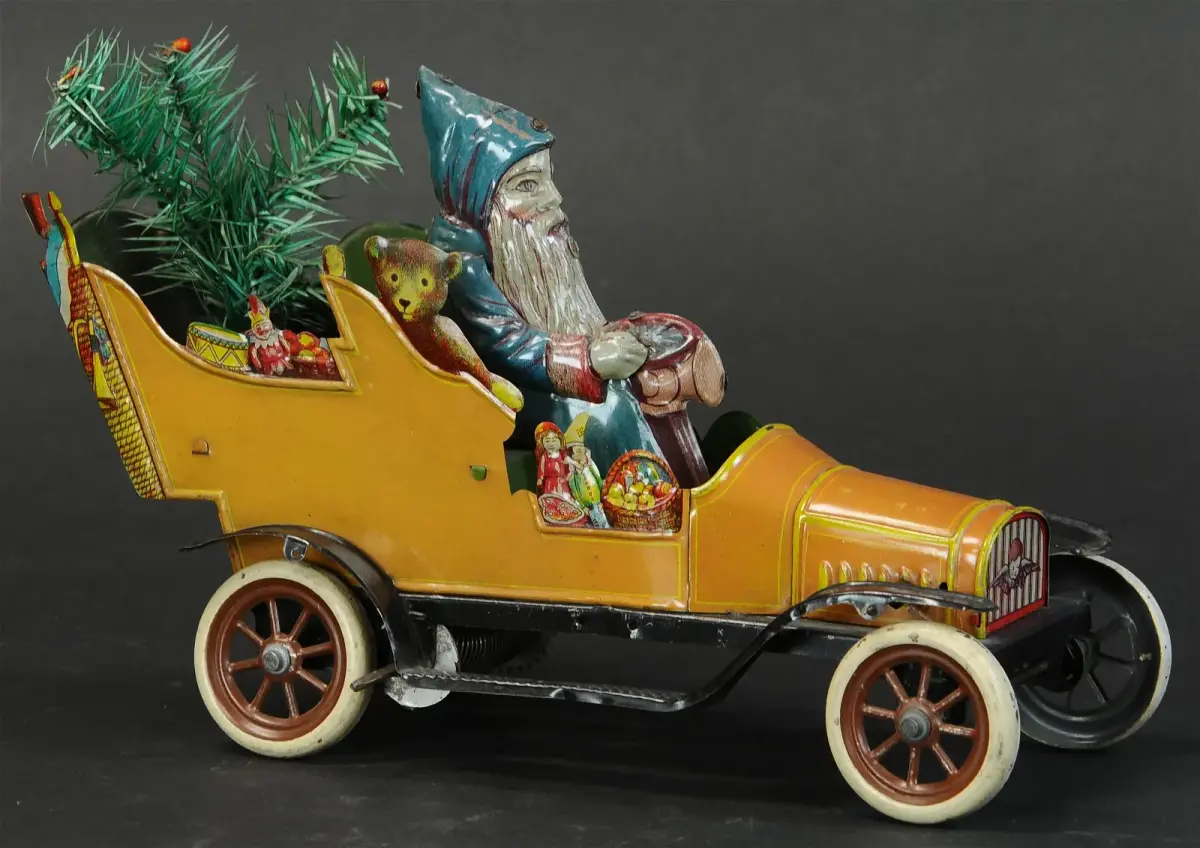 Fischer Father Christmas Car, Germany, c. 1912, sold for $43,200 against an estimate of $15,000-$25,000.