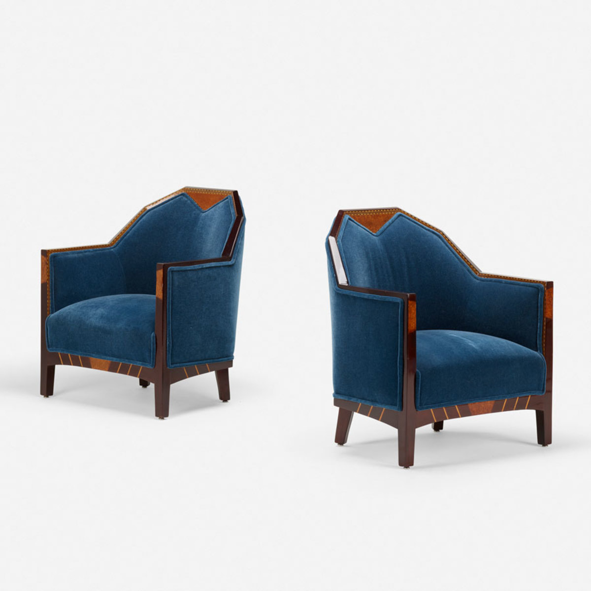 Art Deco is the No. 1 trend in the 20 to 40 age group. Pair of Art Deco club chairs, c. 1930, stained mahogany, mixed wood inlay, mohair; $4,375.