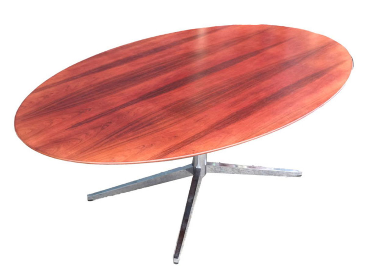 The top trend with ages 40 to 60 is Mid-Century Mod furniture. Florence Knoll Modern oval table desk #2480, designed by Florence Knoll Bassett in 1961 and manufactured 1970s, consisting of an oval, highly figured rosewood top and a chrome finished steel pedestal base; $1,000.