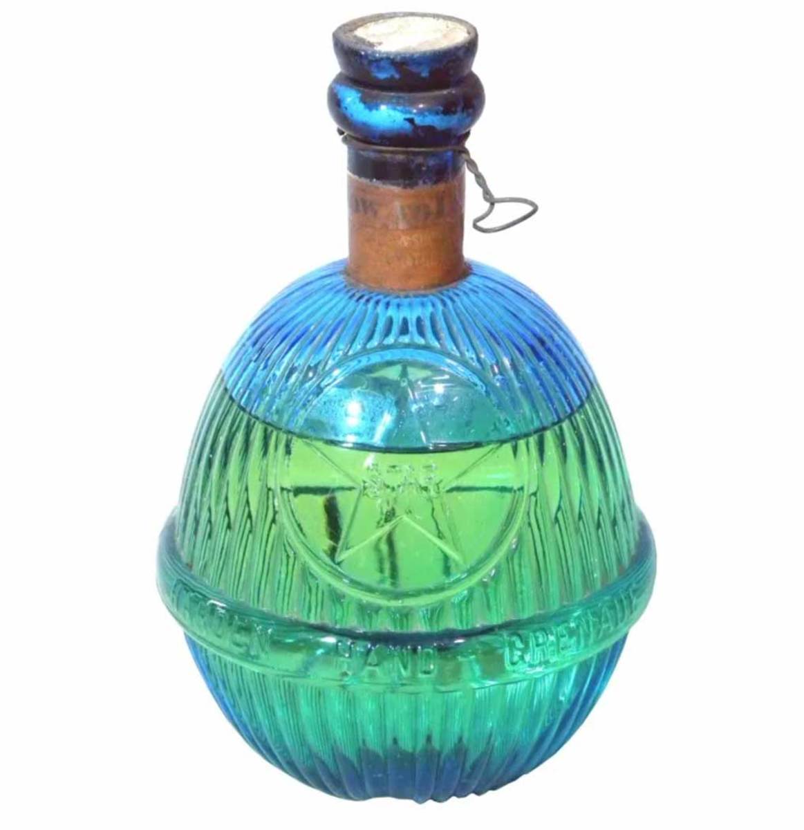 Star Glass Fire Grenade, blue glass with original seal, 8 inches tall.
