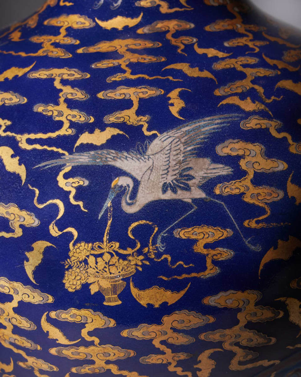 Dreweatts said it is rare to see blue vases painted in both gilding and slightly raised silver. One of the cranes decorating it holds a fower basket, a symbol of Daoism.