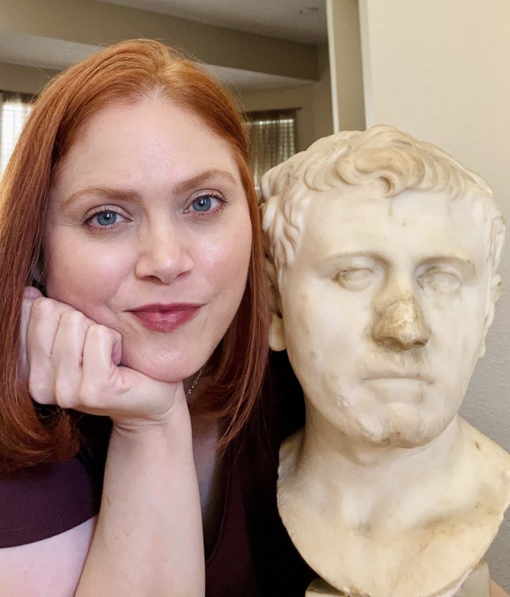 Laura Young with the bust she found at Goodwill that is thought to likely depict Sextus Pompey, who dedicated his life to avenging his father’s death.