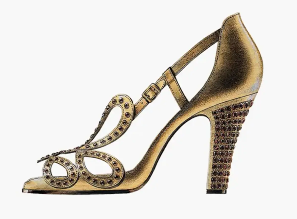 Since she would be standing for nearly three hours, the shoes Queen Elizabeth II would wear to her coronation had to be comfortable — but also fit for a queen. Roger Vivier came up with these, made in the softest gold leather, and with the heels covered in rubies. The design, inspired by the rose windows of the Chartres Cathedral in France, and incorporating a fleur-de-lys motif to match the Imperial State Crown, was kept secret until the big day.