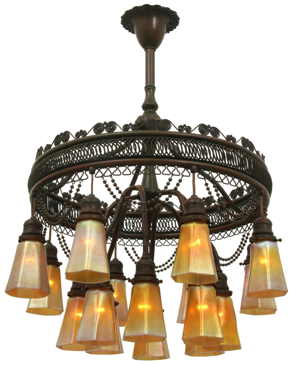 Among the Day 1 highlights on May 22 is this Tiffany Studios “Moorish” chandelier, circa 1905, patinated bronze, Favrile glass, 16 shades are engraved “L.C.T.,” 34-1/2” x 24”; estimate: $40,000-$60,000.