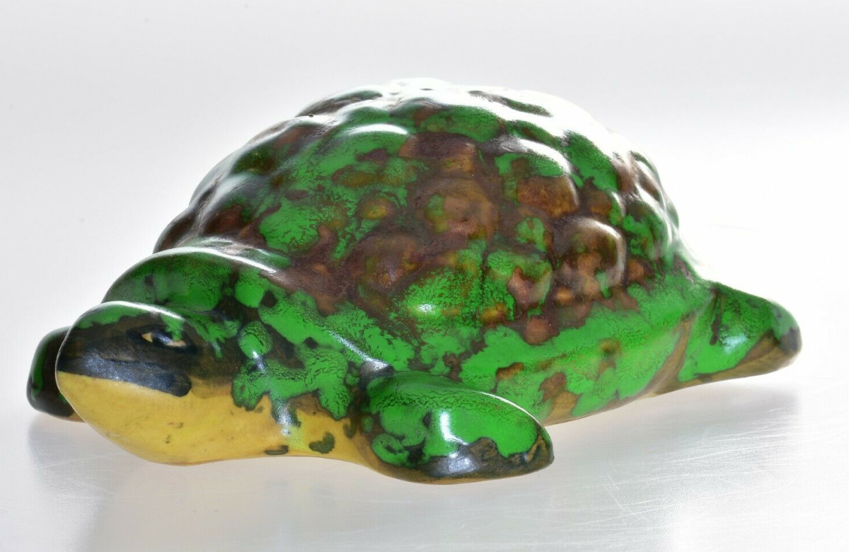 A Coppertone turtle figure, authentic signed and decorator mark “12,” 6” l; $325.