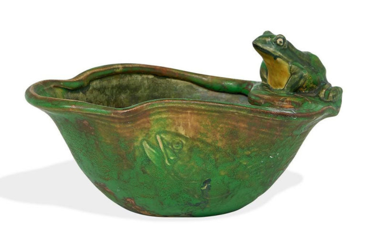 Coppertone bowl with a frog and fish decoration on the side, matte glazed ceramic, stamped marks, Zanesville, Ohio, 10-1/2” w x 7” d x 6” h; $1,500.