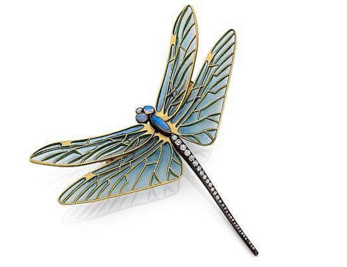 An 18k yellow gold and silver brooch by René Lalique, embellished with diamonds, opals and enamel, early 20th century; $103,000.