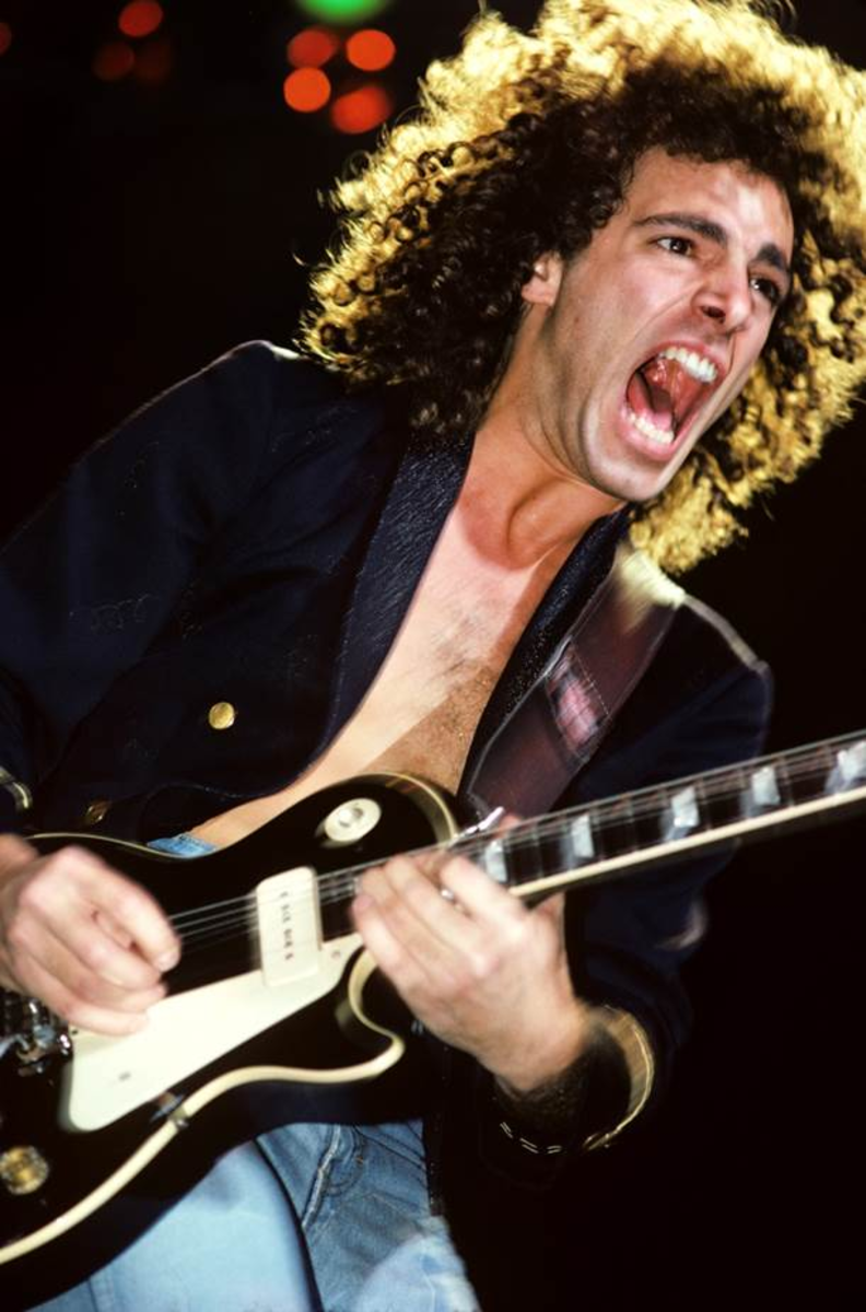 Neal Schon performing with his 1977 black Gibson Les Paul.