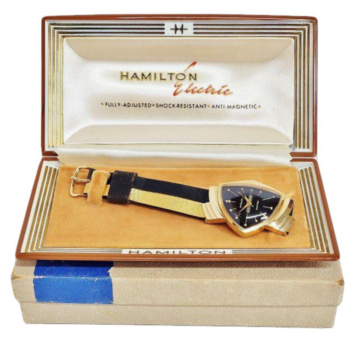 A 14k gold Hamilton Ventura electric watch with original band  designed by Richard Arbib, and with original case; estimate: $3,000-$5,000.