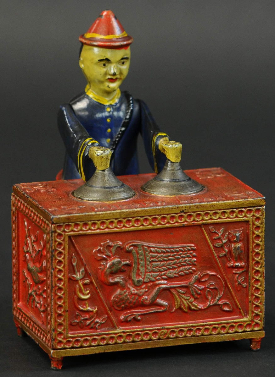 Kyser & Rex Co. Mikado cast-iron mechanical bank, red-table version, extremely rare and one of the best examples known.  Estimate: $80,000-$120,000.
