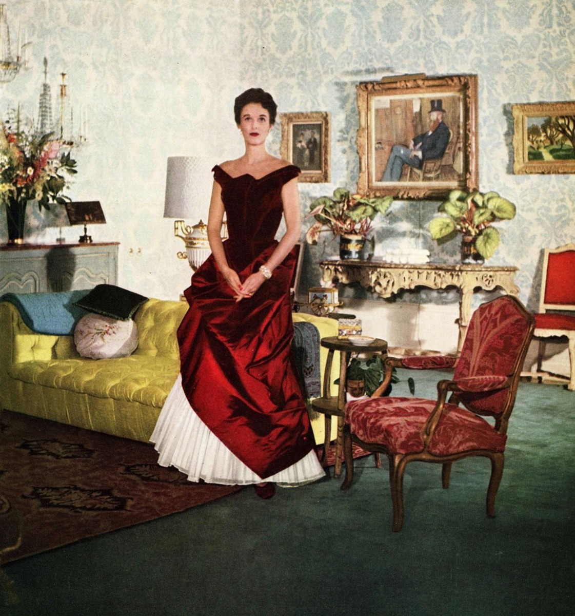 Socialite Babe Paley wearing a crimson James' ball gown, 1950.