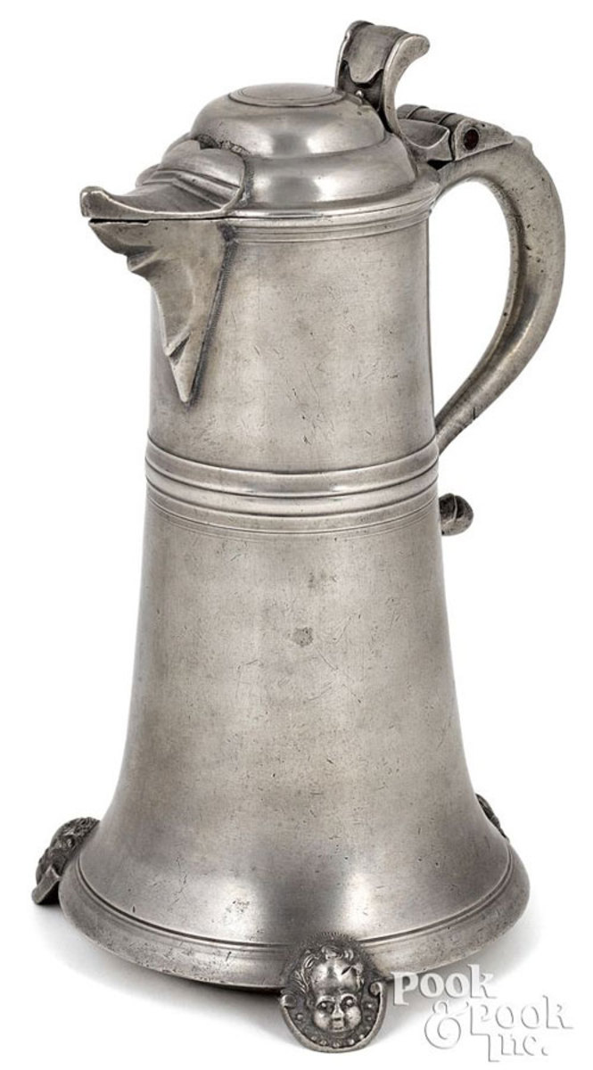 Highly important Lancaster, Pennsylvania pewter flagon, ca. 1770, bearing the touch of Johann Christoph Heyne, 11-1/4" h. Only two other examples in private hands are known. Estimate: $40,000-$60,000.