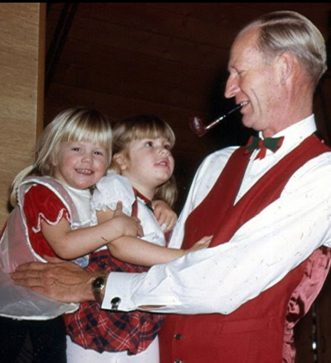 Writer Daylyn Miller as a young child (middle, age 4) and her little sister, Ingrid, snuggle with their grandfather, Hep Peterson.