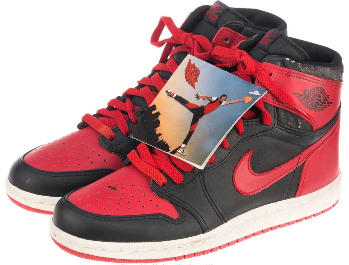 An original, unused Nike Air Jordan I “Breds” Sneakers with string tag and original box (1985) recently sold for $16,250 at Heritage Auctions. The sneakers originally sold for $34.90 (marked down from $49.90) at a Foot Locker shoe store.