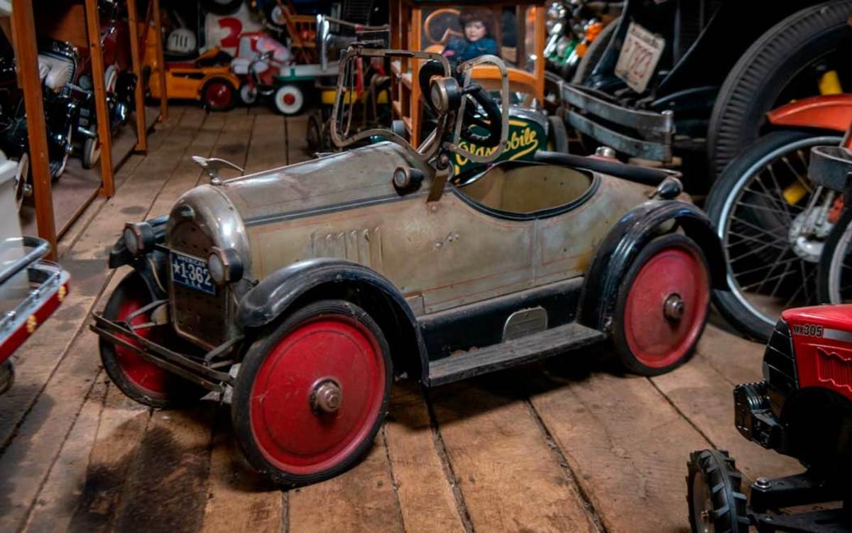 Among one of the most coveted pedal cars to be auctioned is this 1927 American National Lincoln Pedal Car (Lot W377) that, with its windshield frame, hood ornament, headlights, bumper, fenders, suspension, spotlight, horn and spare disc tire, is considered to be one of the finest original pedal cars available. It sold for $25,960.