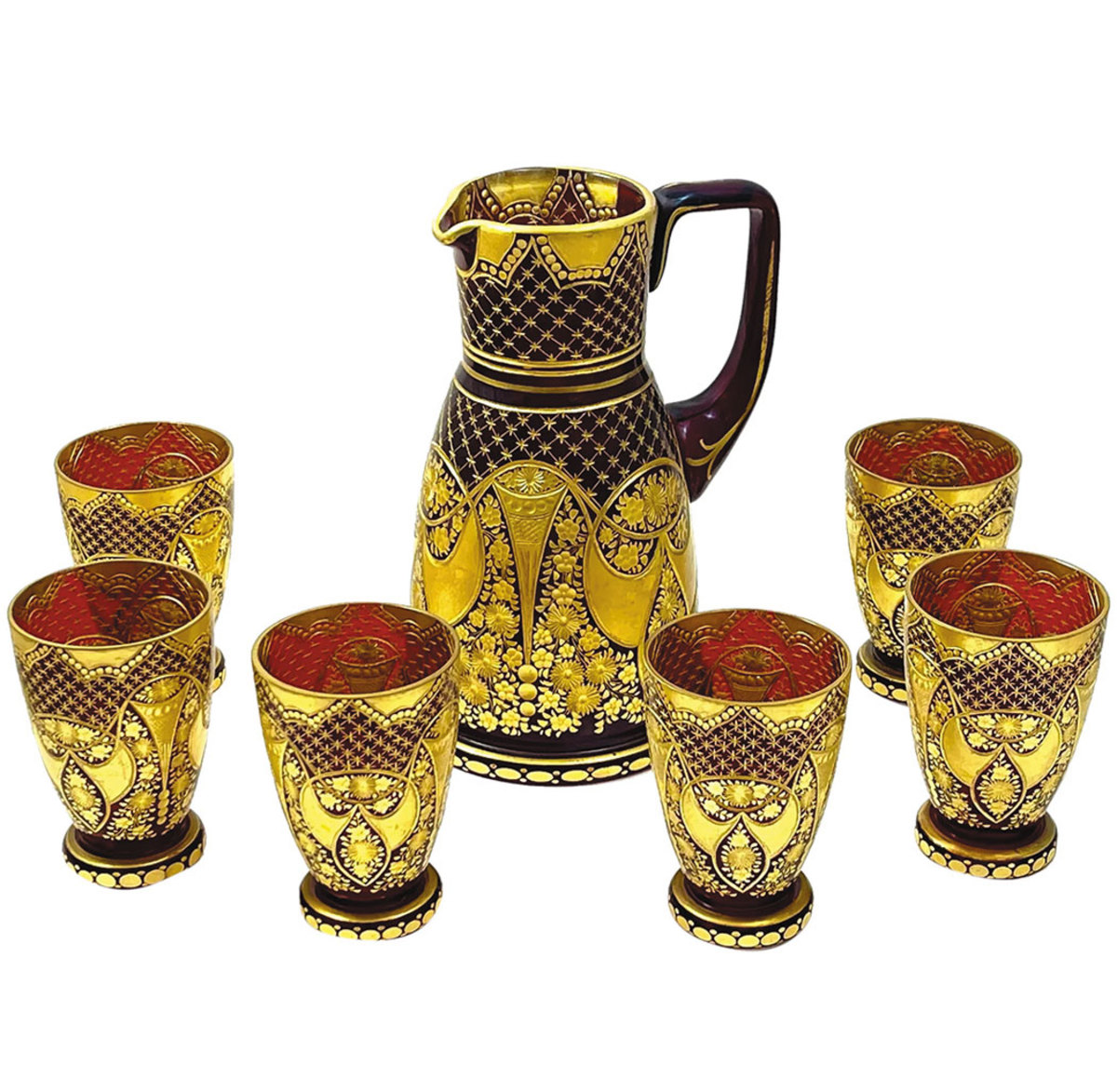 An antique Moser ruby red and gold crystal drinking set: $1,980. 