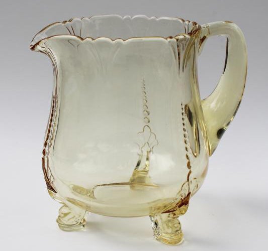 heisey-empress-water-pitcher-dolphin-shape-feet-sahara-yellow-vintage-depression-glass-laurel-leaf-farm-item-no-ts0806156-1.jpg